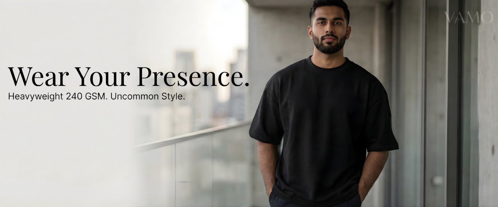 Premium black 240 GSM oversized T-shirt for men with structured shoulder drape and minimal luxury styling.